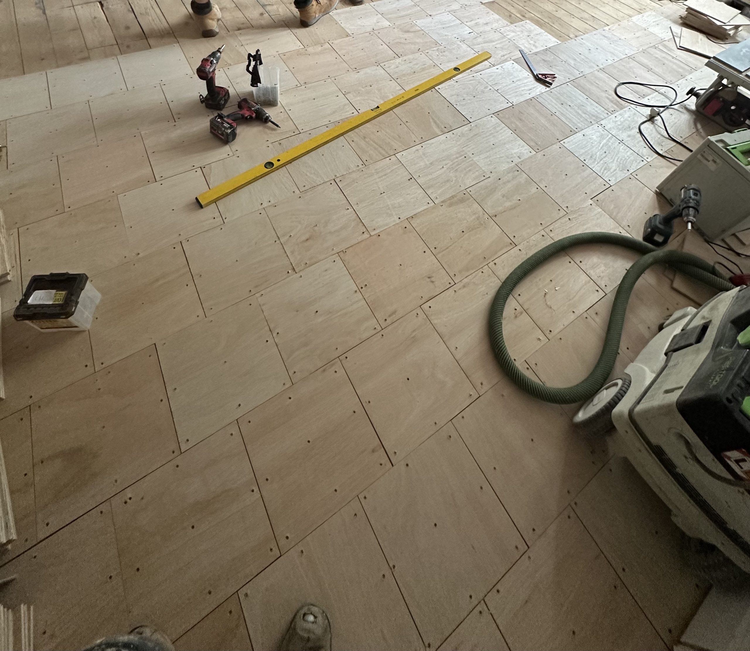 Plywood subfloor preparation in smaller sections before wood flooring installation