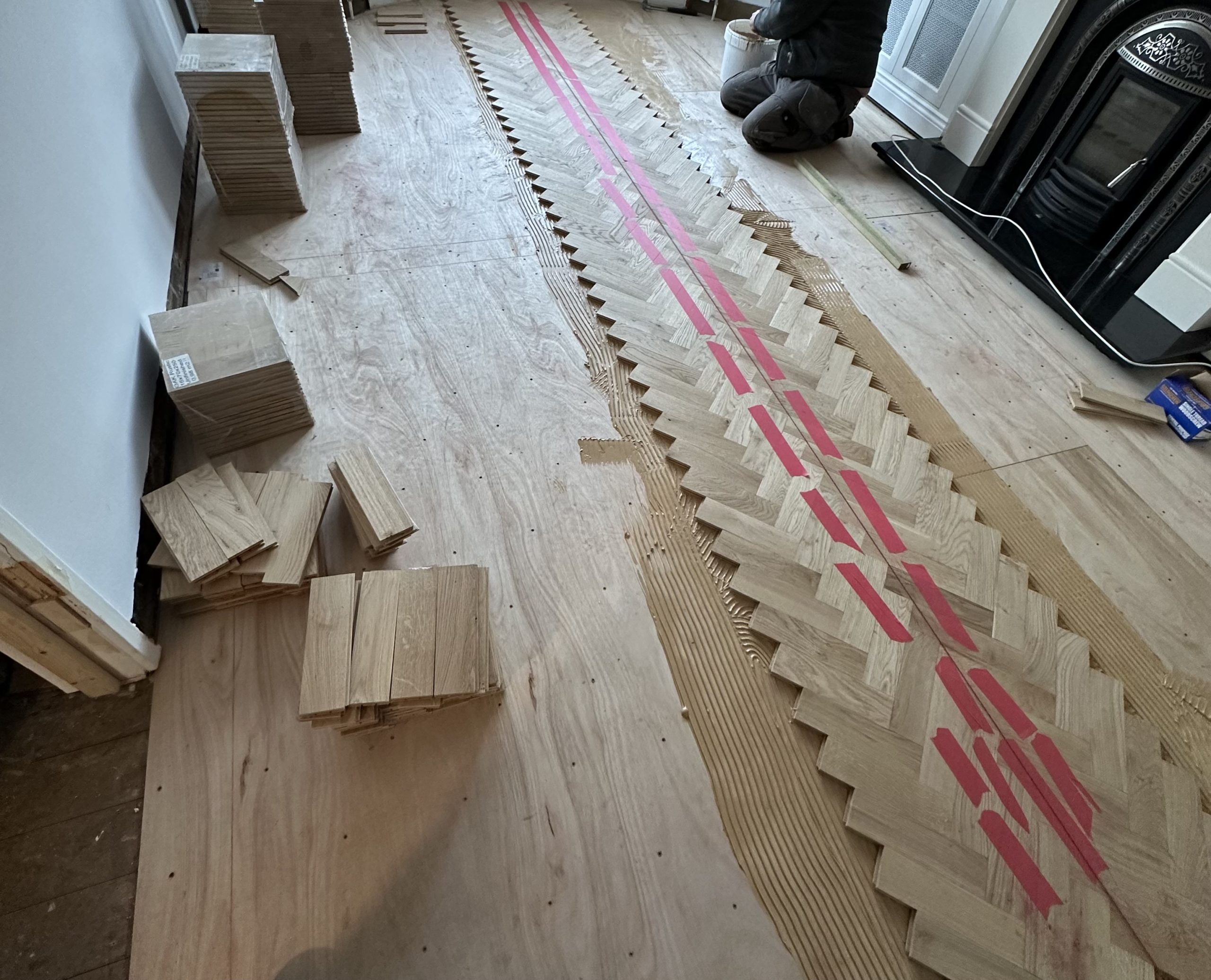 Four-block herringbone crown being installed along the working lines before the main field is filled