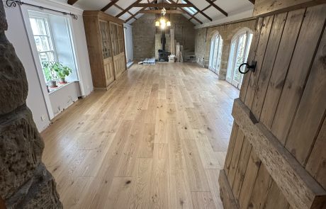Wide plank oak flooring installation Wide plank oak flooring installation in large room