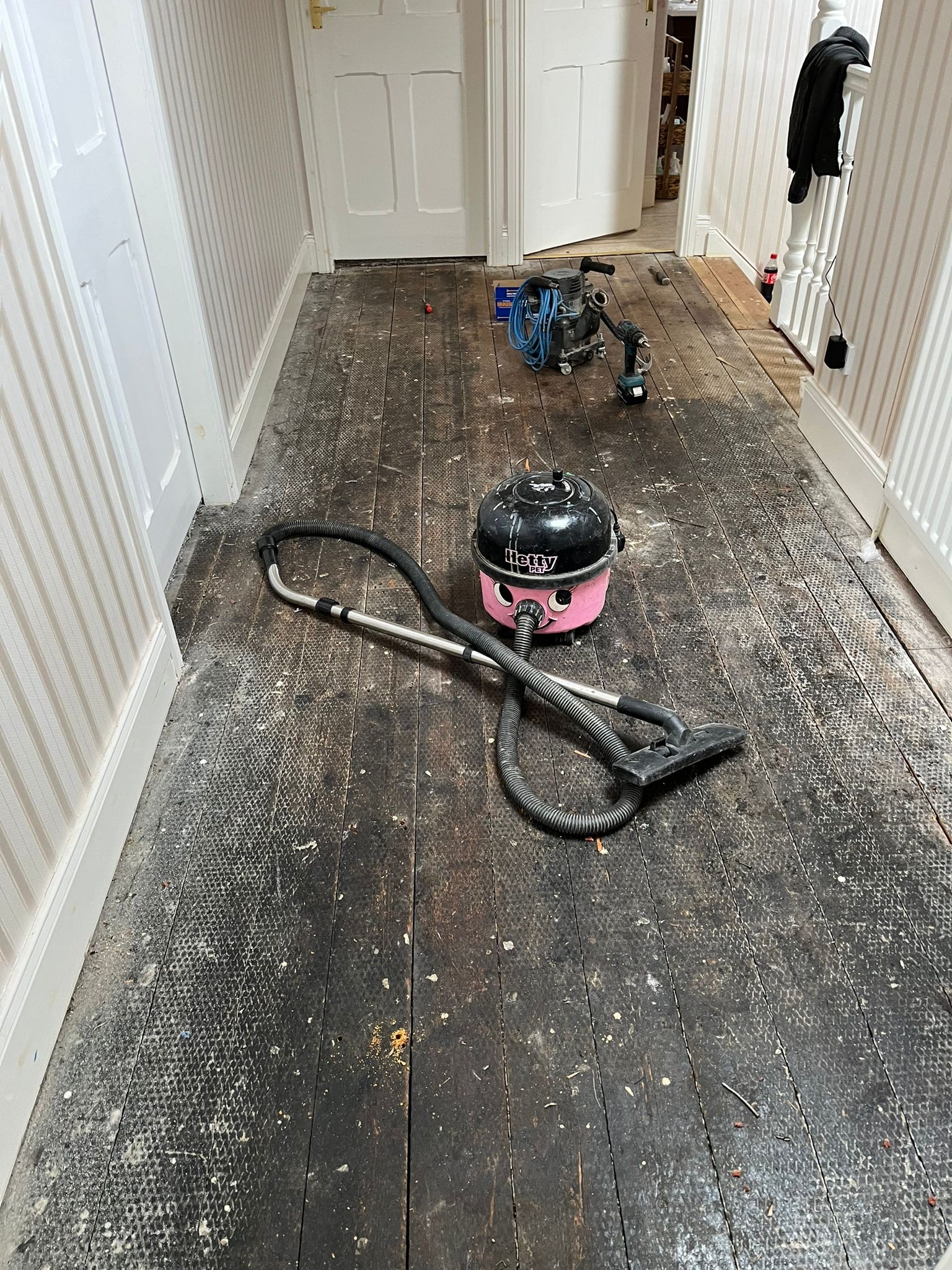 Softwood Floor Before Restoration – Riding Mill Original softwood landing floor before restoration and finishing in Riding Mill