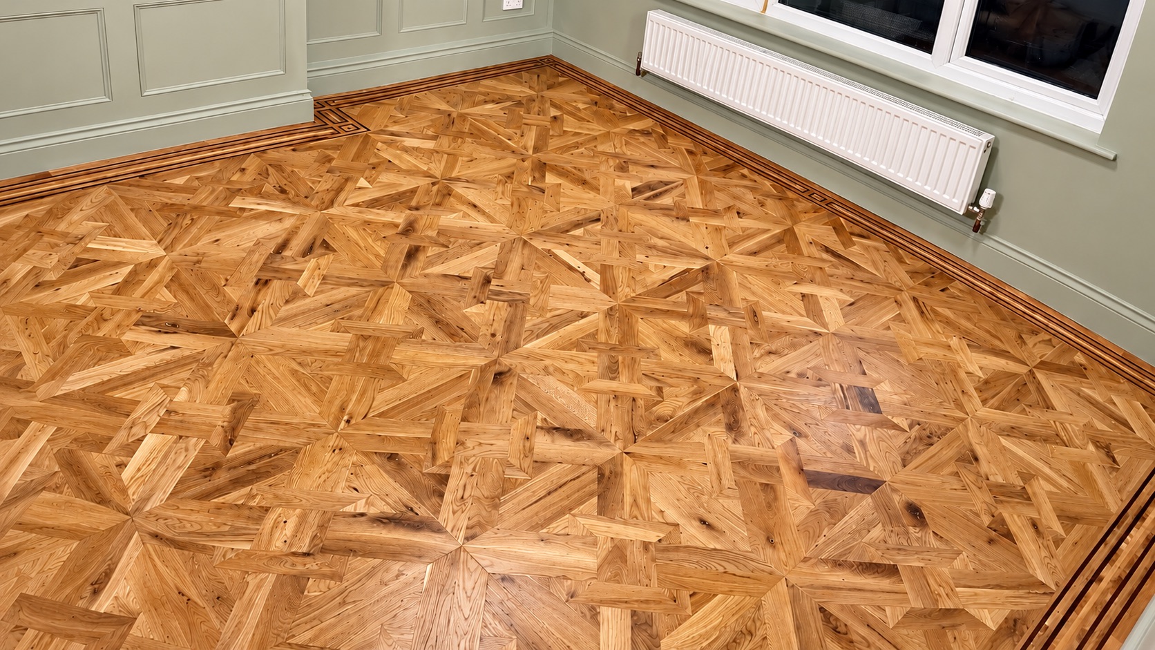 Bespoke Geometric Oak Parquet Flooring Bespoke geometric oak parquet floor with handmade multi-species border