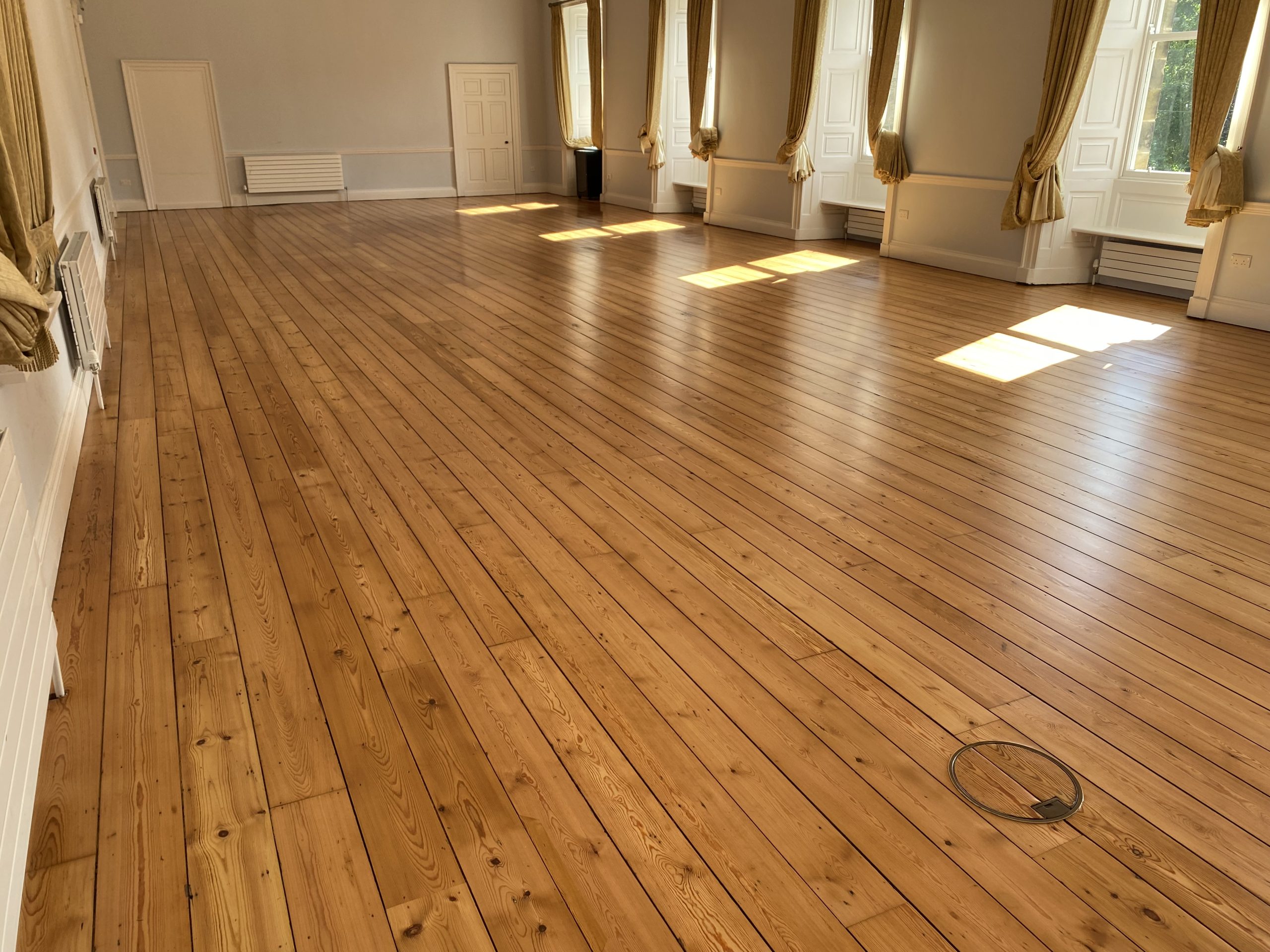 Restored timber flooring within Hexham Abbey