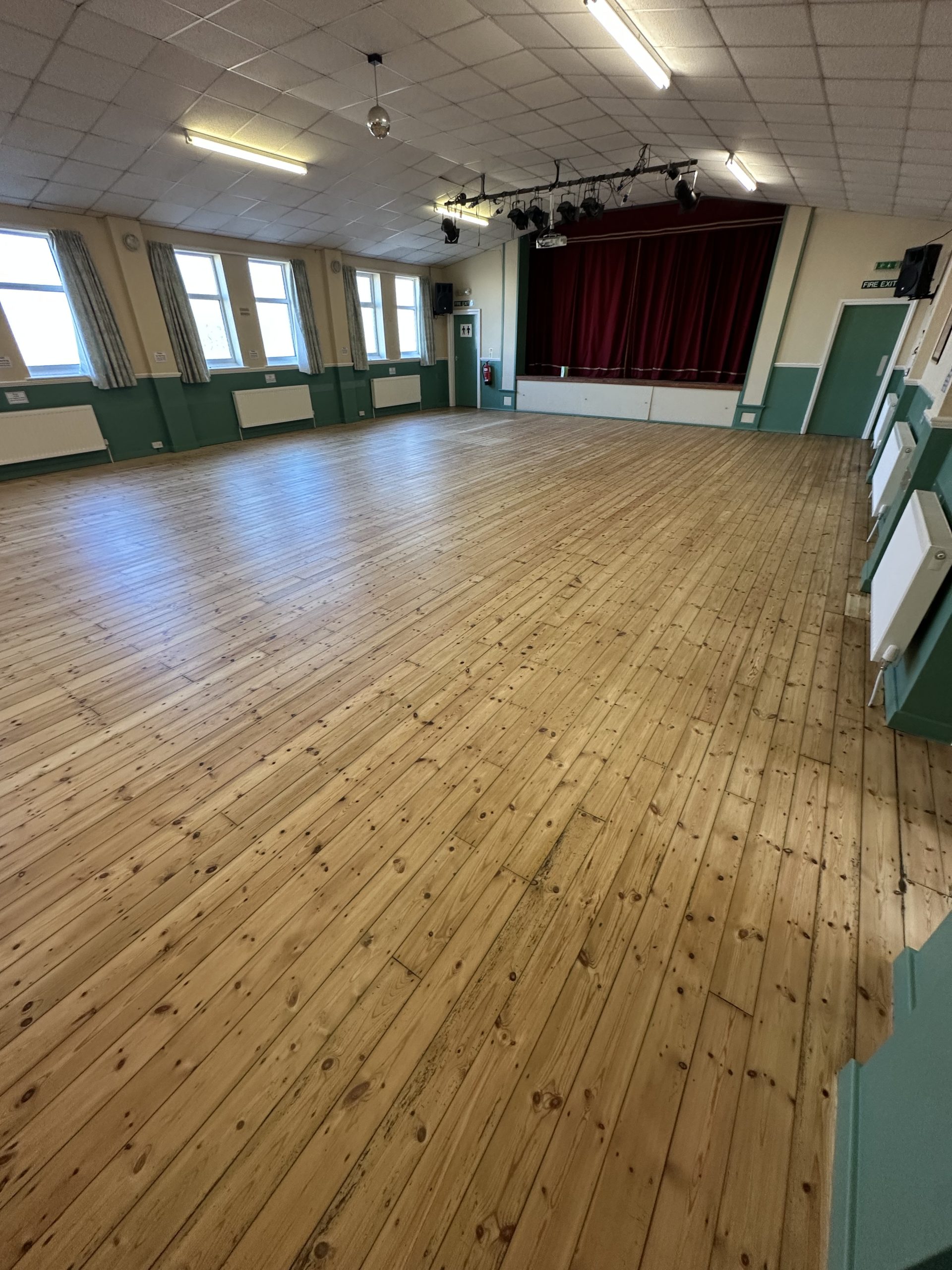 Refinished Softwood Flooring – St Bede’s Church Hall Refinished original softwood floorboards at St Bede’s Church Hall in Blyth
