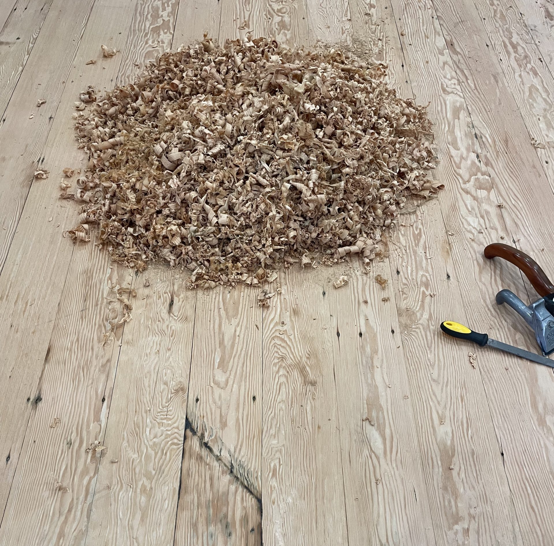 Hand scraping a timber floor by hand Hand scraping a timber floor by hand