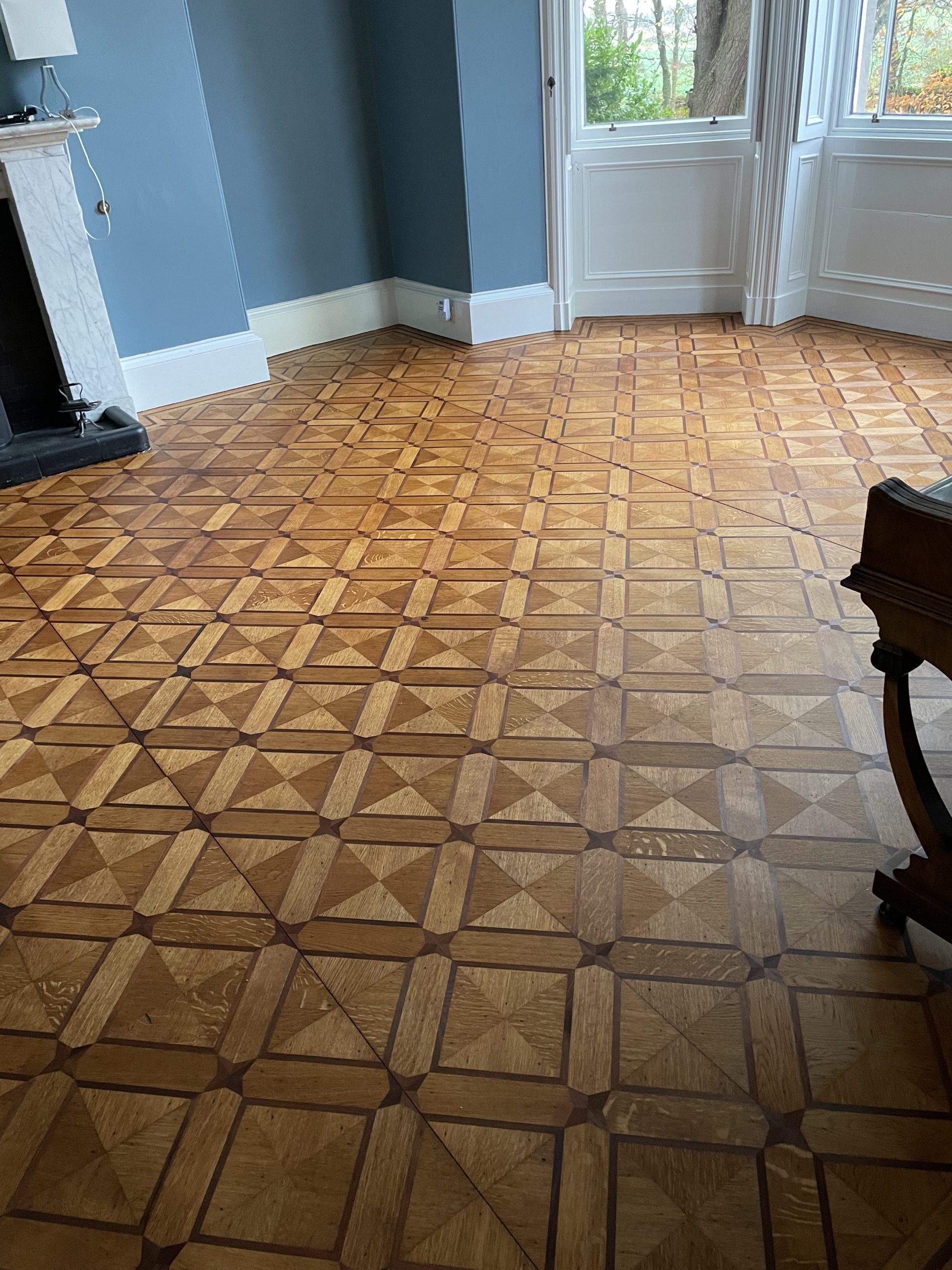 Restored geometric parquet flooring in a period room near Berwick-upon-Tweed
