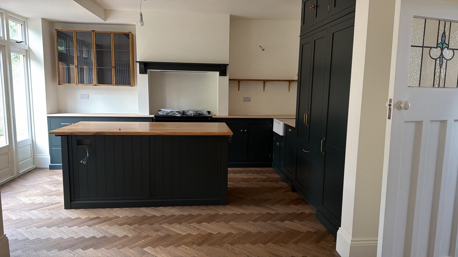 Finished solid oak herringbone flooring installed through a kitchen in Tynemouth