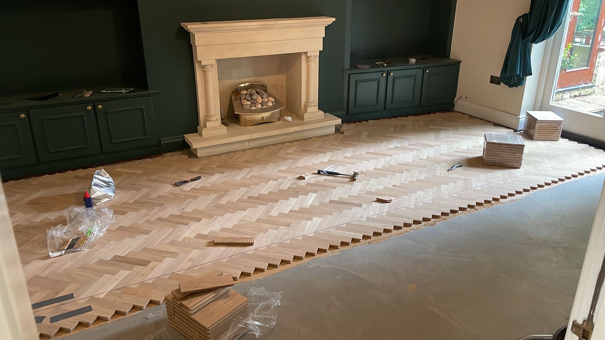 Oak herringbone flooring being installed in a Shotley Bridge home