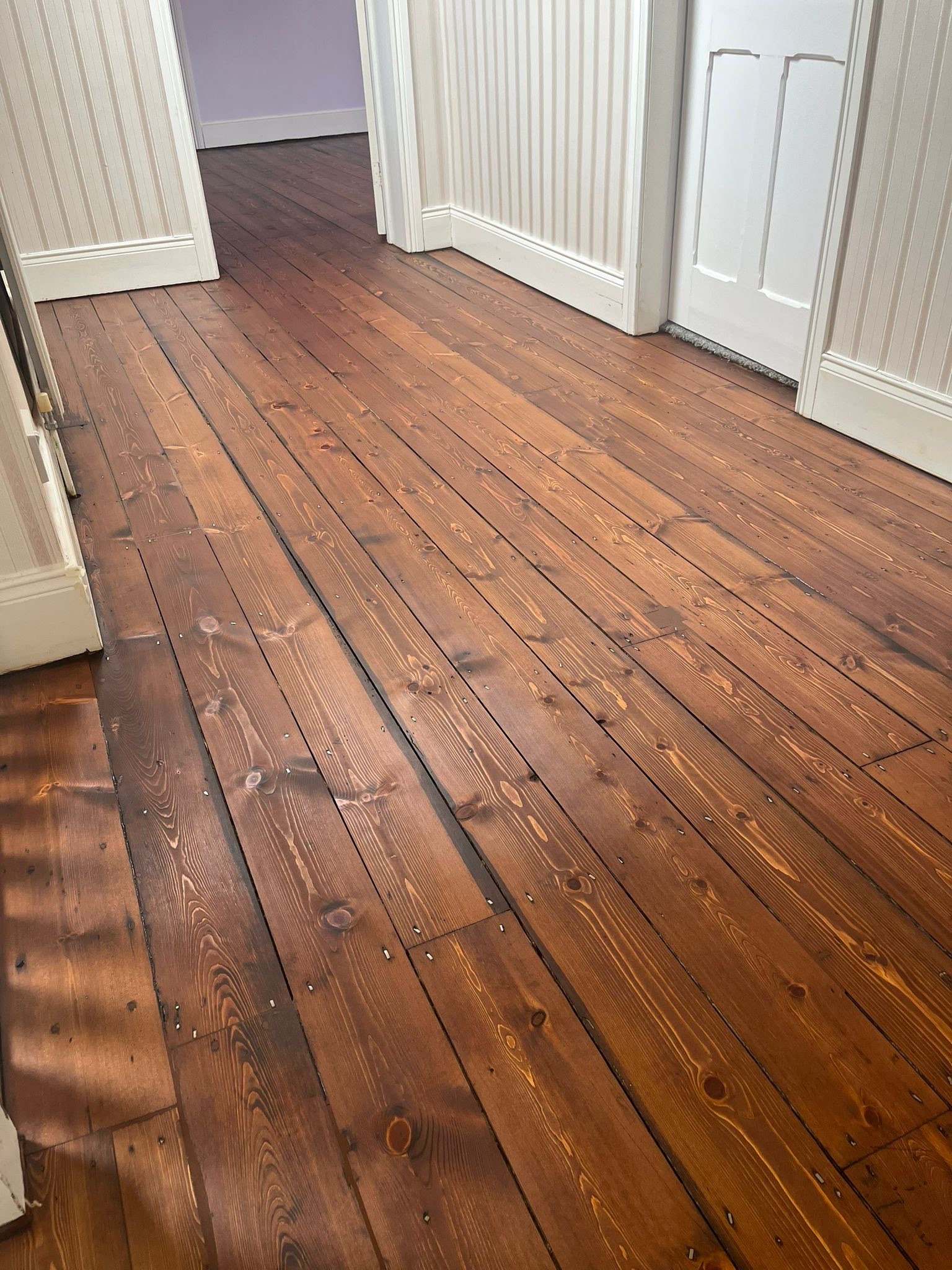 Softwood Floor Restoration and Repairs – Riding Mill Restored softwood floorboards after repairs, sanding and finishing in a Riding Mill home
