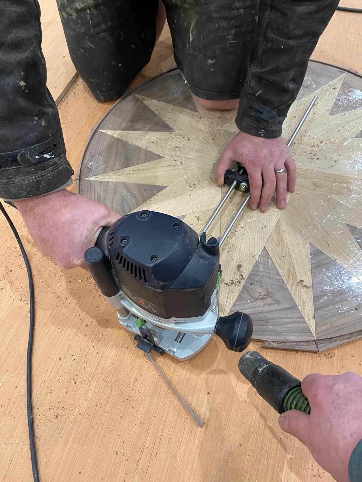 Routing the Handmade Medallion Routing a handmade oak and walnut floor medallion